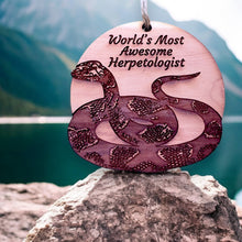 Load image into Gallery viewer, Worlds Most Awesome Herpetologist Snake - Cedar Ornament