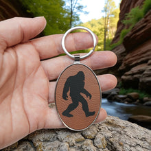 Load image into Gallery viewer, Keychain - Oval/Metal - Bigfoot Sasquatch - Leather