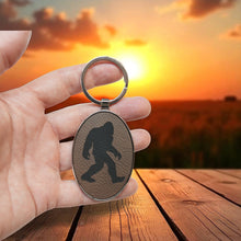 Load image into Gallery viewer, Keychain - Oval/Metal - Bigfoot Sasquatch - Leather
