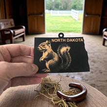 Load image into Gallery viewer, Ornament - Black - North Dakota with Squirrel