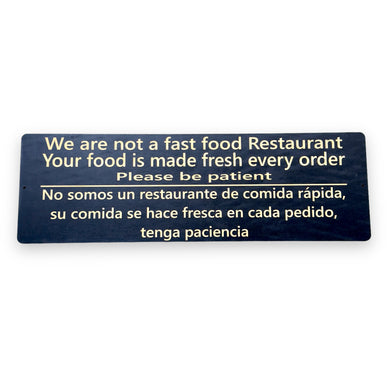 Sign - Black - English & Spanish We are not a fast food restaurant LARGE 10x32