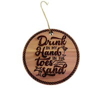 Load image into Gallery viewer, Drink in my hands Toes in the Sand - Cedar Ornament