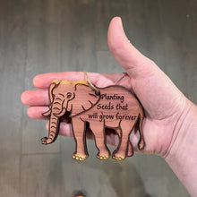 Load image into Gallery viewer, Elephant Planting seeds that will grow forever - Cedar Ornament