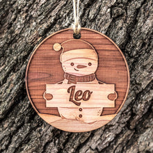 Load image into Gallery viewer, Snowman with Custom Name - Raw Cedar Ornament 3x3in PERSONALIZED