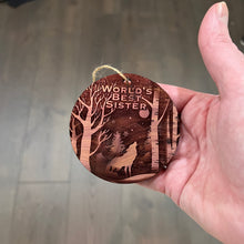 Load image into Gallery viewer, Winter Wolf Worlds Best Sister - cedar ornament