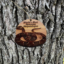 Load image into Gallery viewer, Worlds Most Awesome Herpetologist Snake - Cedar Ornament